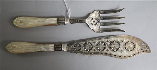 A pair of Victorian mother of pearl fluted handled silver fish servers, Martin, Hall & Co, Sheffield, 1890.
